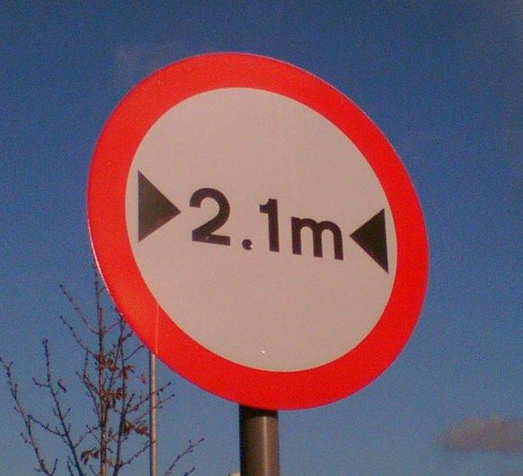 Metric width restriction sign