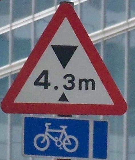 Metric height warning sign